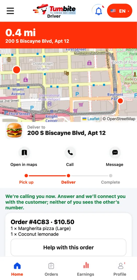 Driver app on the way with the “Call the customer (masked number)” button and the notice “We’re calling you now. Answer and we’ll connect you with the customer.”