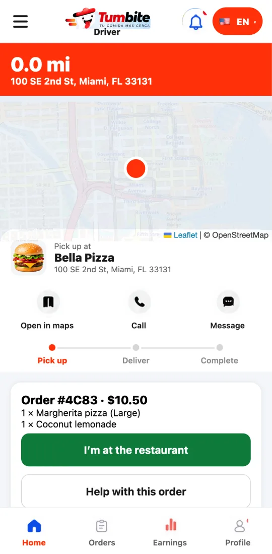Active order in the driver app with the “I’m at the restaurant” and “Help with this order” buttons and the item list.